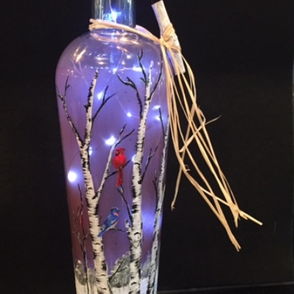 birch tree with blue bird and cardinal